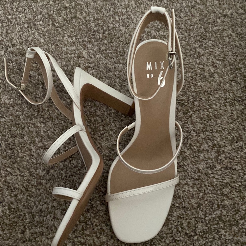 White strappy heels. Never worn.